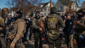 Minnesota Governor Urges Calm After Trump Threatens Insurrection Act as Tensions Flare in Minneapolis